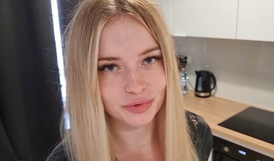 The blonde enjoyed having sex standing at the kitchen table